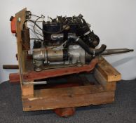 Three bearing Austin Seven engine, on test stand with ancillaries including carburettor, fuel