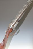A Lancaster of London 12 bore side by side ejector shotgun with named and border engraved locks,