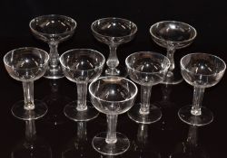 A set of eight hollow stemmed cut glass champagne glasses