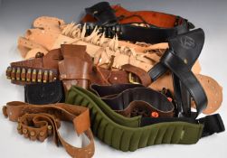 Three leather pistol belts with holsters, a cartridge pouch, three other cartridge/bullet belts