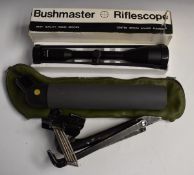Bushmaster 8x56 rifle scope in original box together with a Greenkat 60mm spotting scope in