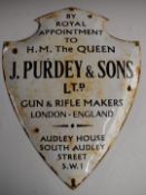 James Purdey & Sons enamel shield shaped shop display or advertising sign 'By Royal Appointment to