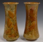 Pair of Royal Doulton Foliage Ware pedestal vases decorated in the Autumn Leaves pattern, H24cm
