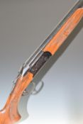 Valmet 12 bore over and under ejector shotgun with engraved lock and underside, chequered semi-
