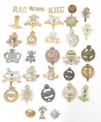 British Army small collection of Cavalry / Royal Armoured Corps metal badges including Dragoon and