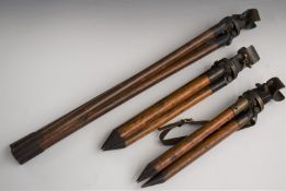 Three military bronze and wood telescope tripods marked 'E R Watts & Son Canada Limited 1914' Sig