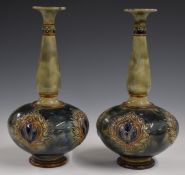 A pair of Royal Doulton pedestal vases, one with LP monogram to base, H25.5cm