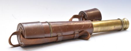 Four draw telescope in leather case with leather carry strap and ends