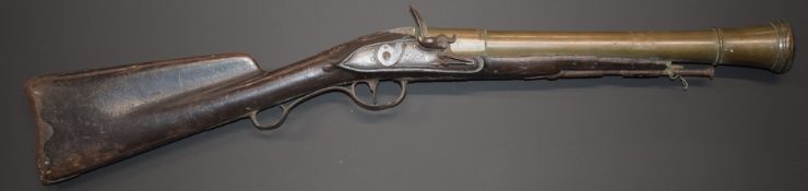 Flintlock blunderbuss with lock engraved possibly 'L Libert', iron butt plate trigger guard and