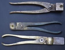 Three pairs of bullet moulds, one stamped M.H. Benn.