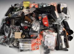 A large collection of shotgun and rifle parts and accessories including Howa trigger guard and