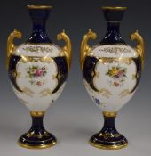 Coalport pair of twin handled pedestal vases decorated with flowers, H18cm