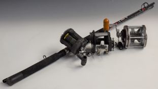 Three multiplier fishing reels comprising Penn Senator, Grice and Young Tatler and Abu, together