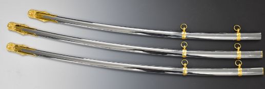 Three modern sword scabbards, probably US Marine Corps, longest 92cm.