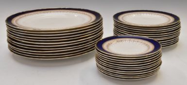 Approximately thirty eight pieces of Royal Worcester dinner ware decorated in the Regency pattern
