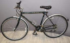 Claud Butler Legend bicycle with 20 inch frame and Shimano 18 speed gears, with original handbook