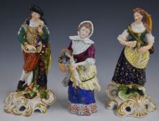 Pair of 19thC porcelain figures of musicians and another figure of a lady with a basket, tallest