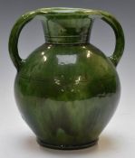 A twin-handled pedestal pottery vase with impressed 357 to base, probably Linthorpe, H25cm