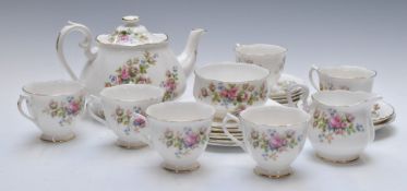 Twenty one pieces of Royal Albert tea ware decorated in the Moss Rose pattern, tallest 14cm