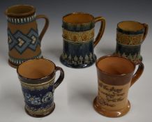 Five Royal Doulton / Lambeth tankards including a Mottoware example with 'Pots' imprinted to base,