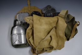 Quantity of Cold War military clothing and equipment including trousers, haversacks, mess tins,