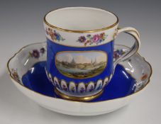 Meissen oversized waisted cup and saucer with hand decorated cartouche of Dresden and floral
