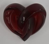 Lalique Coeurs Entrelaces red frosted glass paperweight signed Lalique France to the base, 73x67mm.