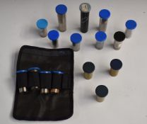 Sixteen Beretta and similar shotgun chokes, most in branded plastic tubes.