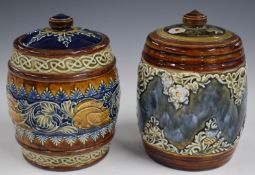 Two Doulton Lambeth covered tobacco jars, H14cm