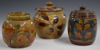 Three Royal Doulton Foliage Ware tobacco jars / pot pourri decorated in the Autumn Leaves pattern,