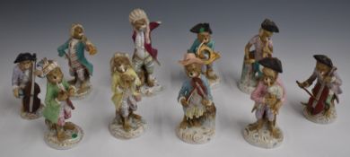 Meissen style continental porcelain monkey figures forming a band, each playing a musical instrument