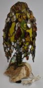 Art Deco Dali style rock crystal and coloured glass lamp raised on a partly polished marble base,