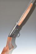 Browning .22 semi-automatic rifle with engraved lock, chequered semi-pistol grip and forend,