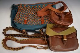 Two leather and canvas shotgun cartridge bags on by Lightwood & Son of Birmingham together with