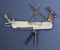 Multi function sportsman's pocket knife including cartridge extractor for 16 and 12 gauge. PLEASE