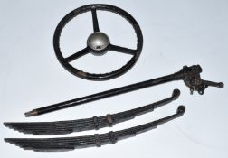 Austin Seven late type steering column, steering wheel and a pair of rear springs