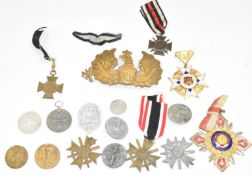 Small collection of German Nazi badges and medals