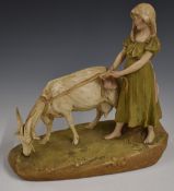 Royal Dux figure of a girl with goat, H28.5cm