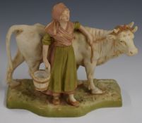 Royal Dux figure of a milkmaid and cow, H19cm