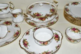 Approximately fifty six pieces of Royal Albert Old Country Roses dinner and tea ware including