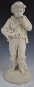 Copeland Parianware figure of a boy with bird's nest, H42cm