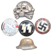 Five German Third Reich Nazi pin badges including an SS example and one marked Reichs Luftschutz