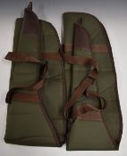 Two padded and wool lined shotgun or rifle slips.