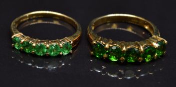 Two 9ct gold rings set with diopside, size N, 5.6g