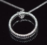 A 10k white gold circular pendant set with diamonds, 1.8g, 1.8cm diam with silver chain