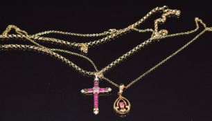 A 9ct gold cross pendant set with rubies and diamonds and 9ct gold pendant set with a ruby, both