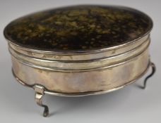 Hallmarked silver tortoiseshell lidded dressing table casket, raised on three feet and with velvet