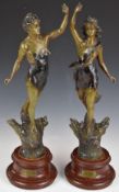 A pair of patinated spelter figures after Hippolyte Moreau 'Les Roses and Les Hirondelles' on
