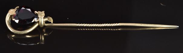 Victorian stick pin/ hat pin set with a pear cut garnet
