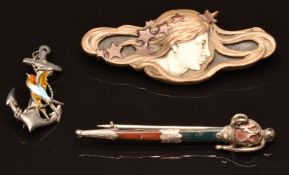 Victorian silver brooch set with agate, a silver anchor and bird brooch set with enamel and an Art
